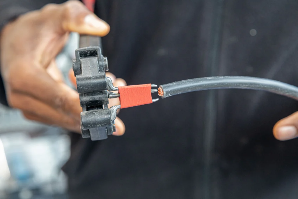 Electrician Working with Automotive and Electrical Wire Connectors and Terminals